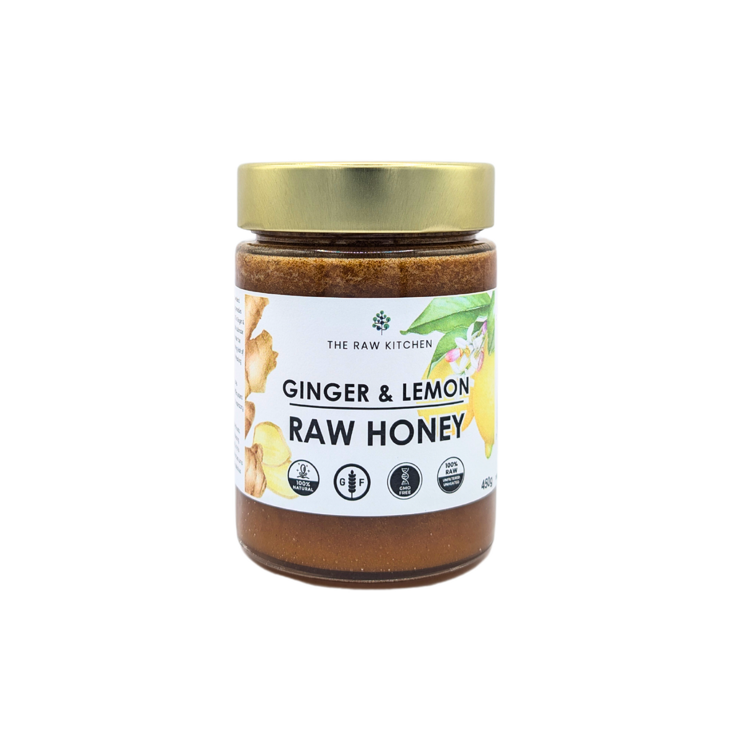 A 450g glass jar of Ginger & Lemon Raw Honey with a gold lid and branded label - The Raw Kitchen UK.