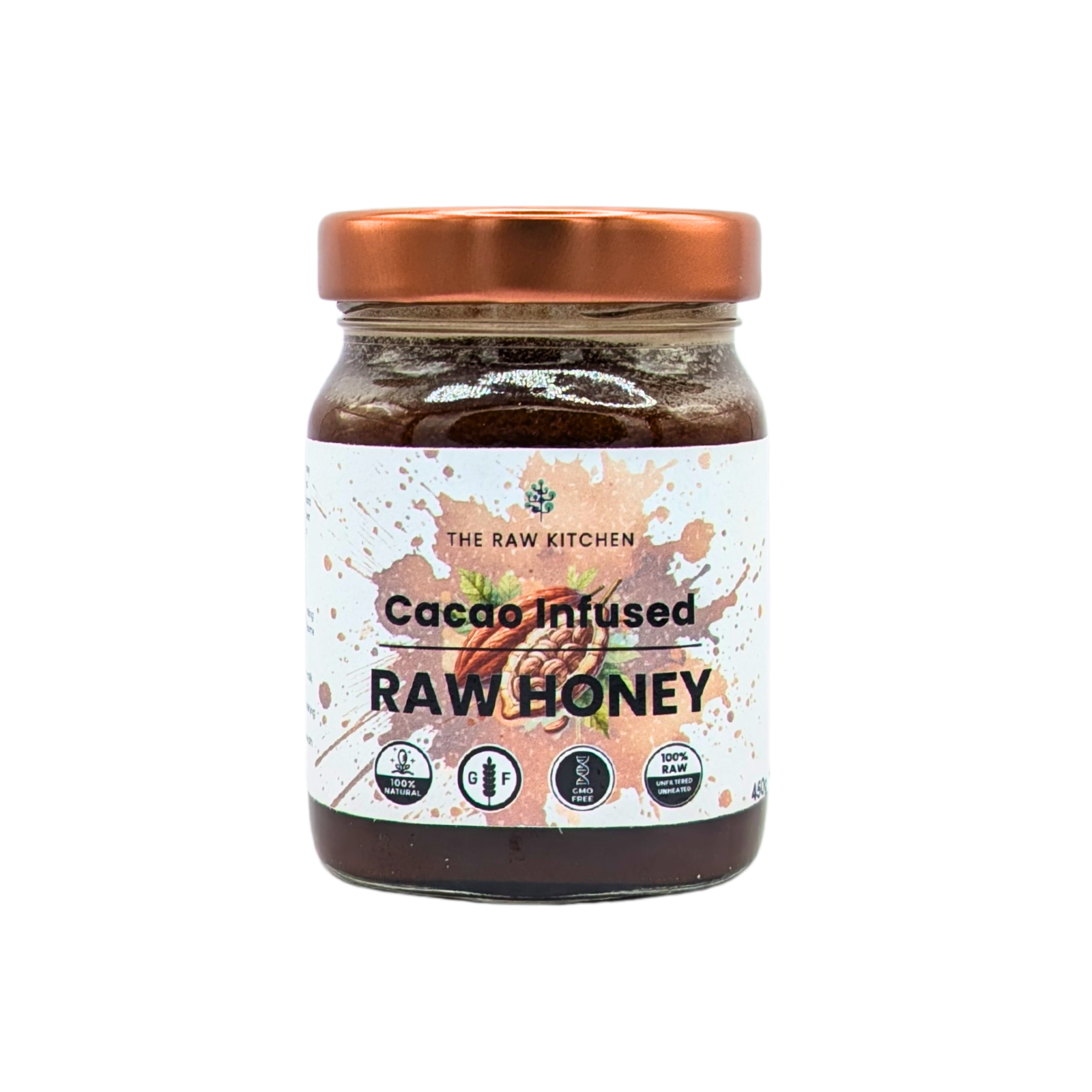 A 450g glass jar of Cacao Infused Raw Honey with a rose gold lid and branded label - The Raw Kitchen UK.