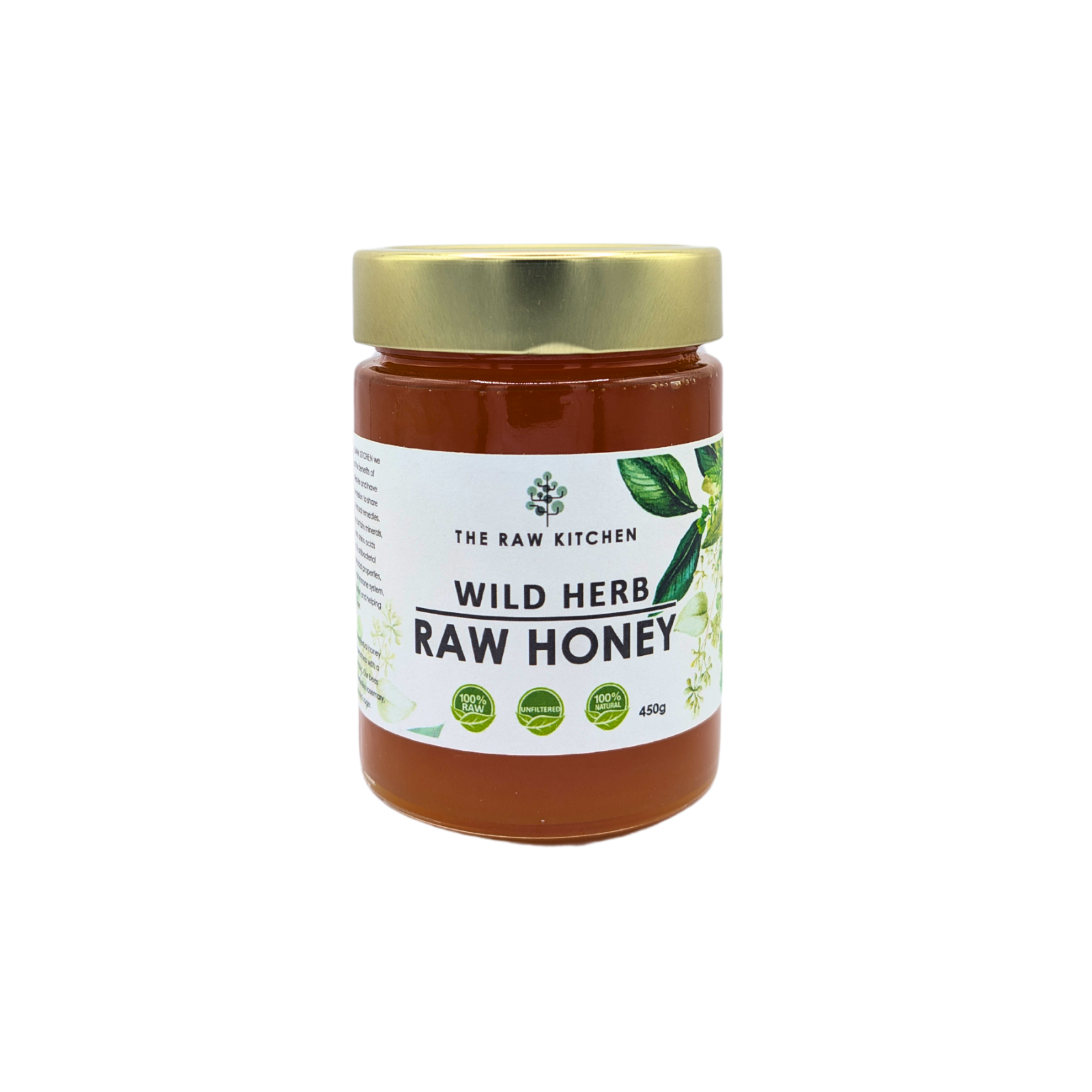 A 450g glass jar of Wild Herb Raw Honey with a gold lid and branded label - The Raw Kitchen UK.