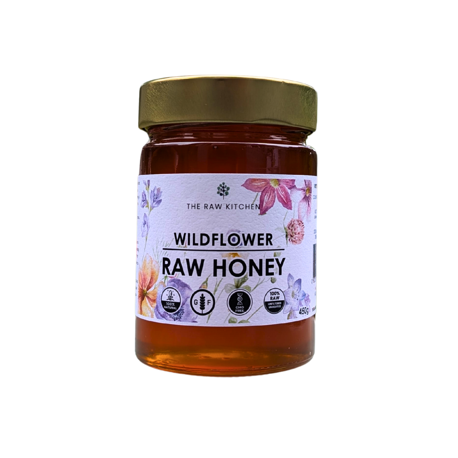 Jar of wildflower raw honey with a label on a white background