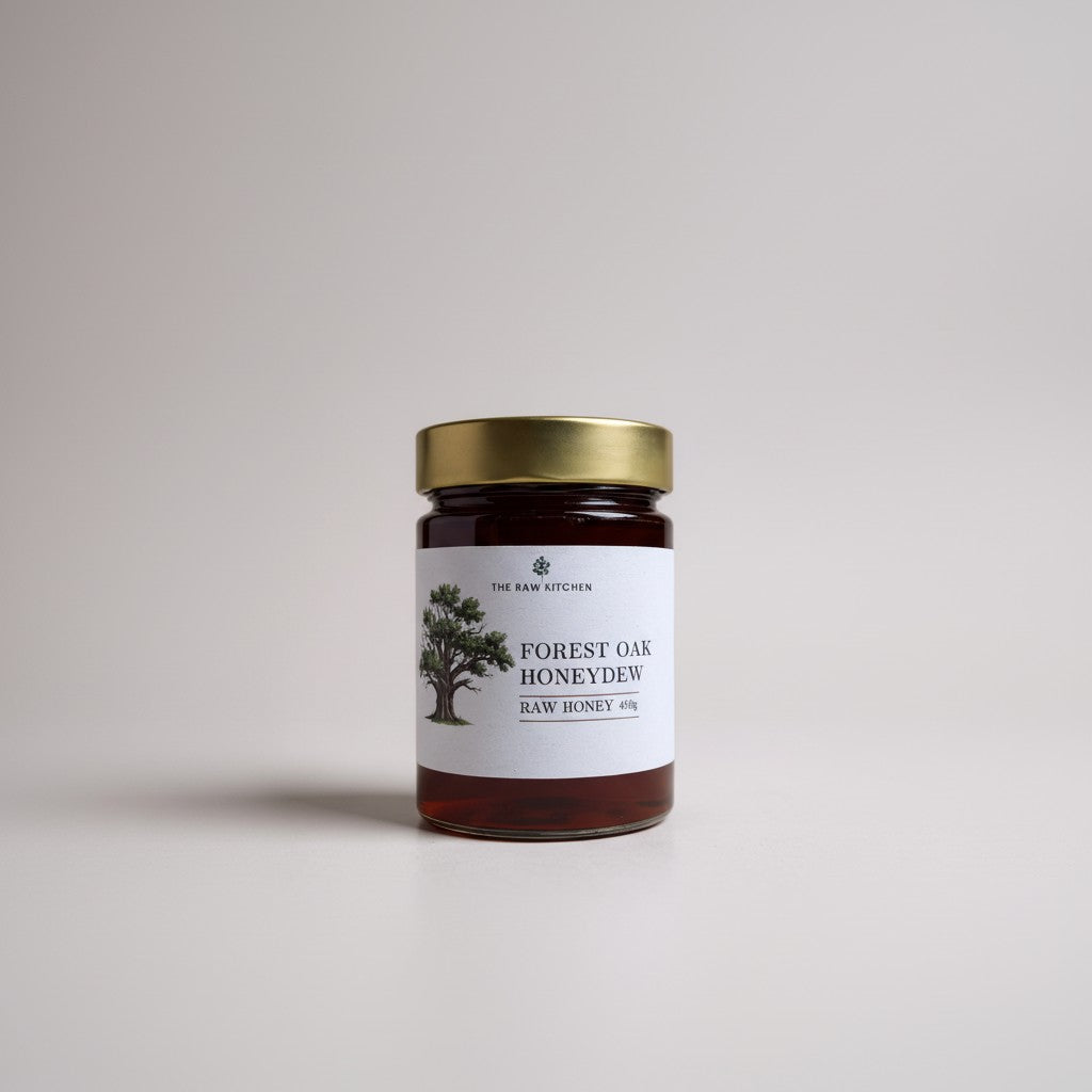 A jar of forest oak honeydew honey on a white background